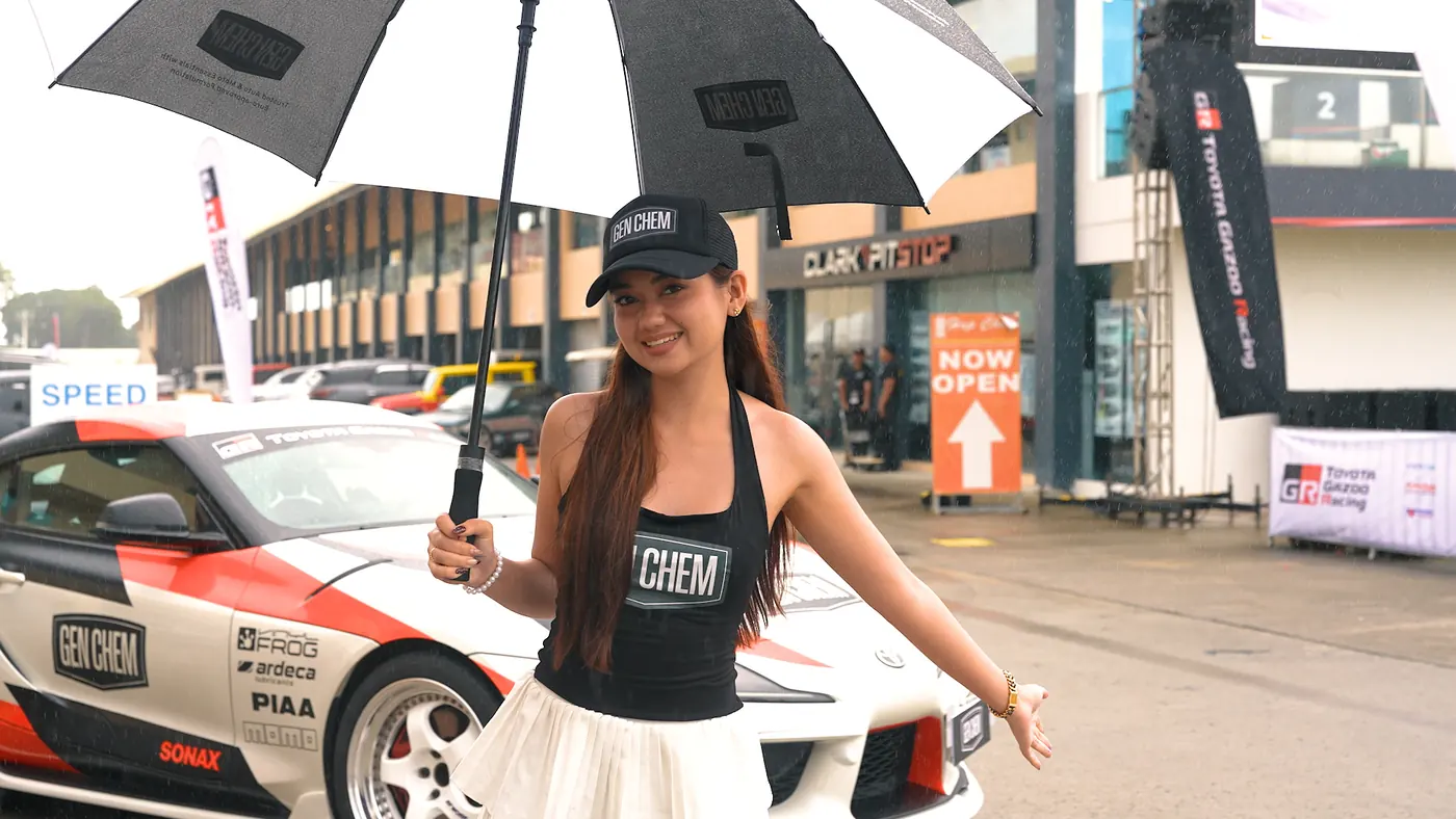 GEN CHEM ambassador beside the branded Toyota GR Supra