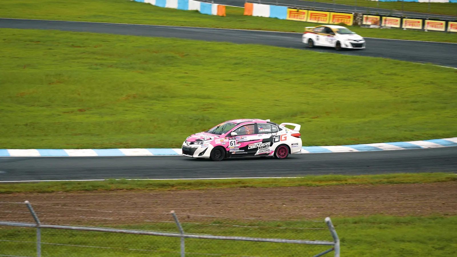 GEN CHEM-sponsored Toyota GR Supra driving on the race circuit
